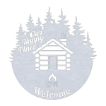Round aluminum wall sign with a precision-cut design featuring a log cabin with a smoking chimney surrounded by pine trees. The words 'Our Happy Place' and 'Welcome' are artistically cut into the metal with a campfire symbol below. The smooth metallic sheen adds to its rustic charm.
